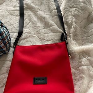 New without tags. Beautiful red crossbody.